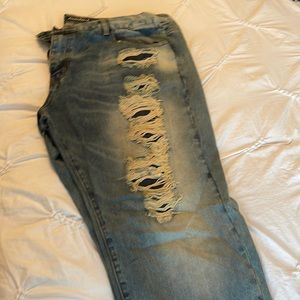 Embellish denim jeans washed look. With rips